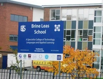 A photograph displaying the exterior of the Brine Leas School building.