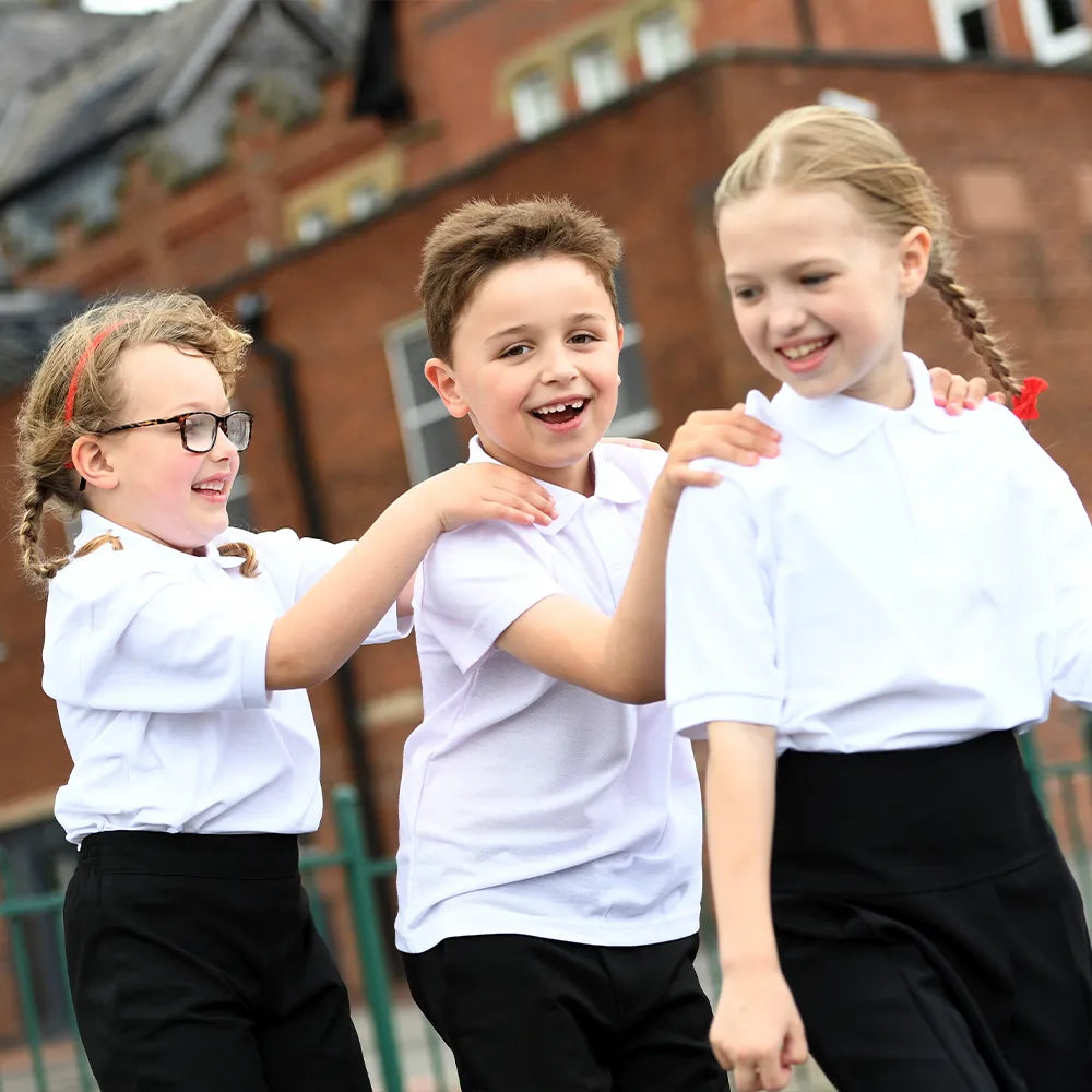 3 students wearing David Luke Primary School Uniforms - Northwich Schoolwear