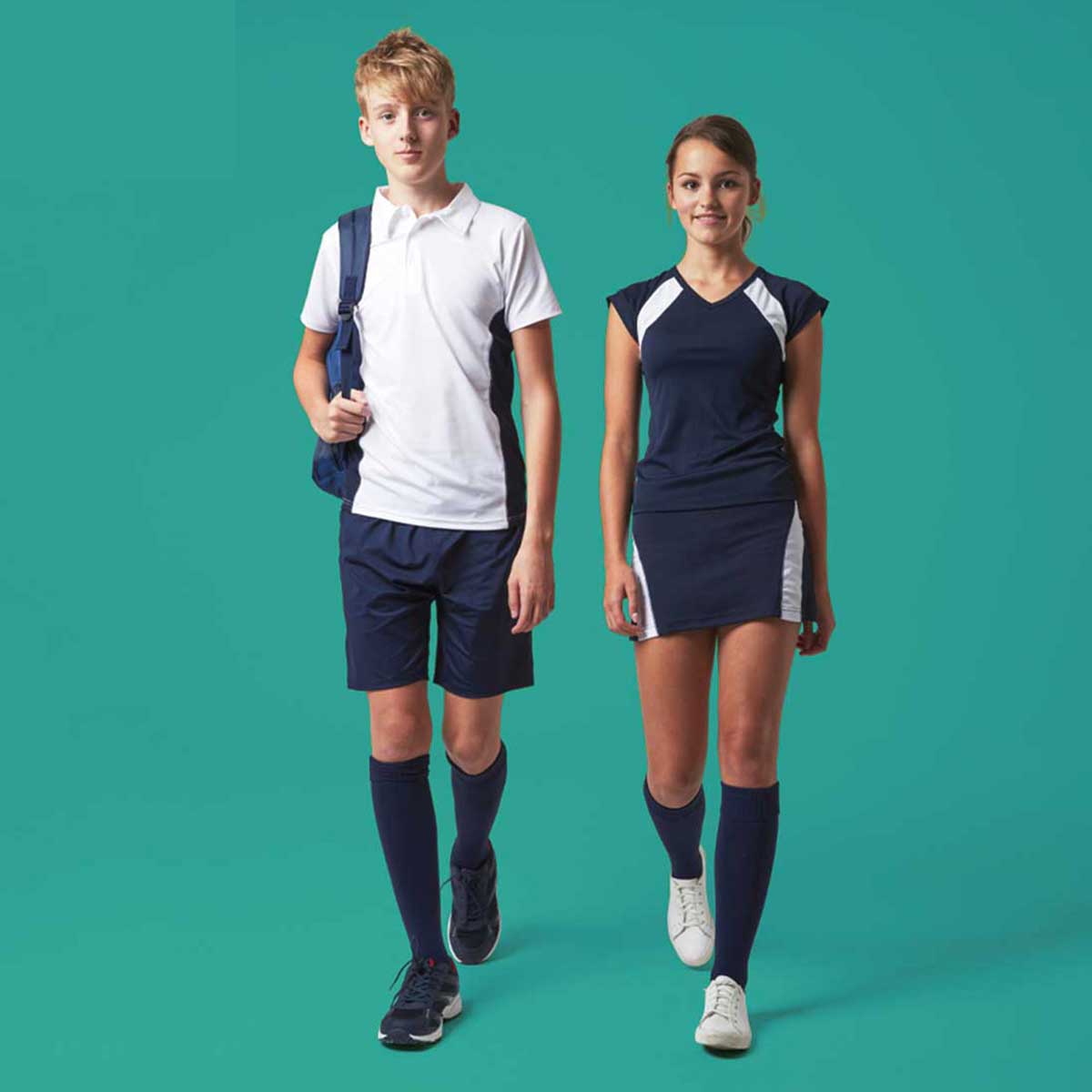 A secondary school boy and girl wearing school sports clothing by DL sportswear with a blue background